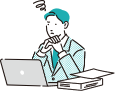 パソコンの前で悩んでいる男性のイラスト
